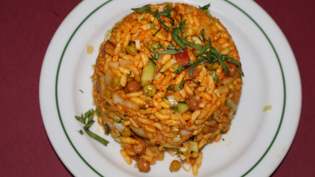 Traditional Nepali Chatpate puffed rice snack served on a plate