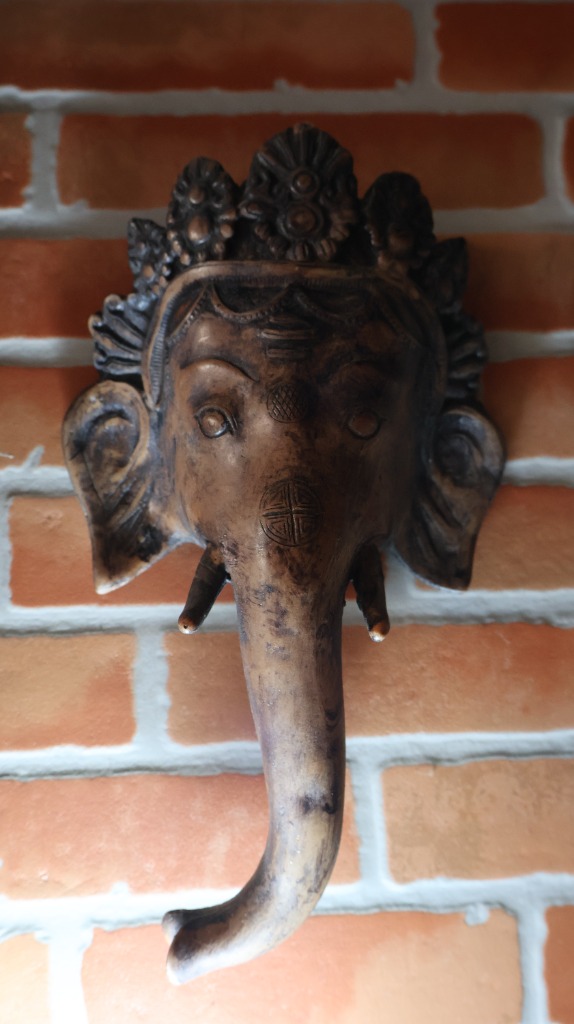 Ornate wood-carving of Lord Ganesha